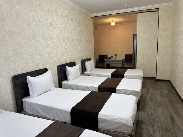 Imagen de la habitación del Hotel Yantai. Foto 15