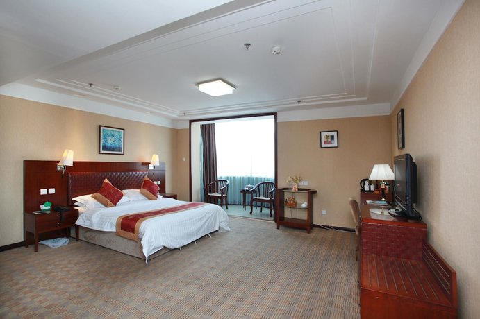 Imagen de la habitación del Hotel Yantai Golden Beach Hotel. Foto 6