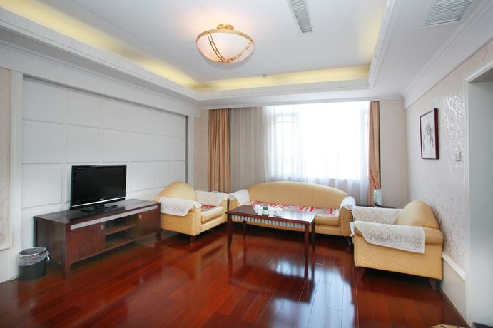 Imagen de la habitación del Hotel Yantai Golden Beach Hotel. Foto 10