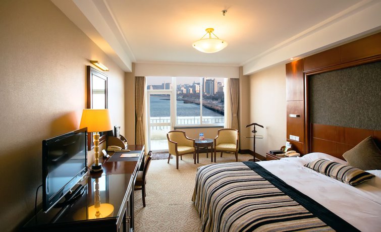 Imagen de la habitación del Hotel Yantai Golden Gulf. Foto 10