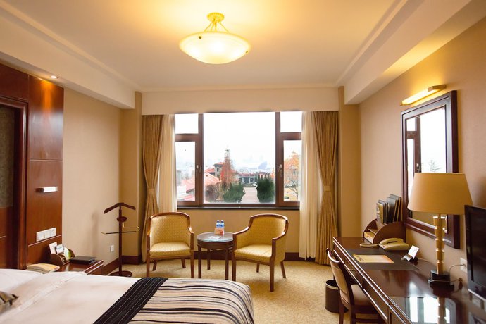 Imagen de la habitación del Hotel Yantai Golden Gulf. Foto 11