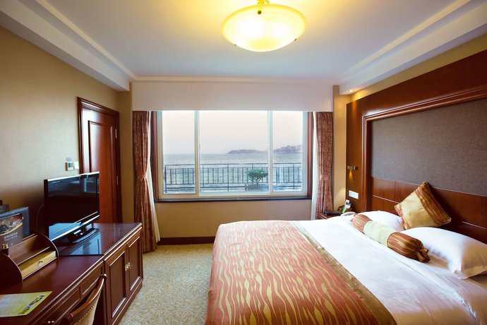 Imagen de la habitación del Hotel Yantai Golden Gulf. Foto 14