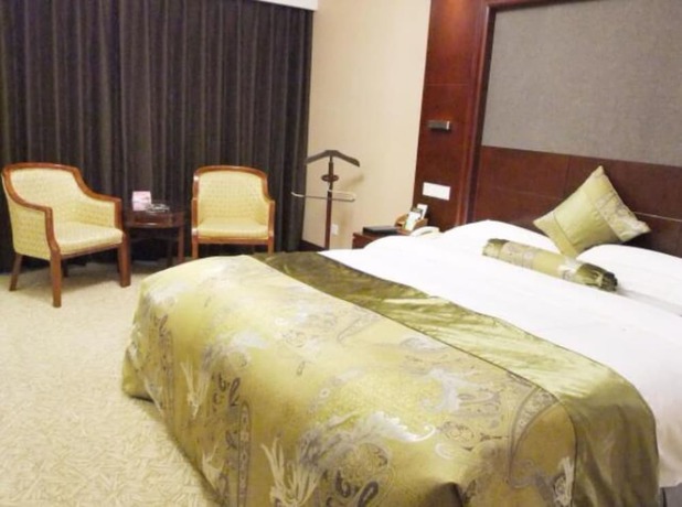 Imagen de la habitación del Hotel Yantai Golden Gulf. Foto 17