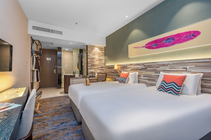 Imagen de la habitación del Hotel Yantai Lijing Peninsula. Foto 8