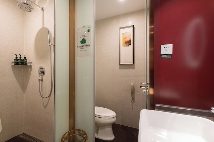Imagen de la habitación del Hotel Yantai Lijing Peninsula. Foto 9