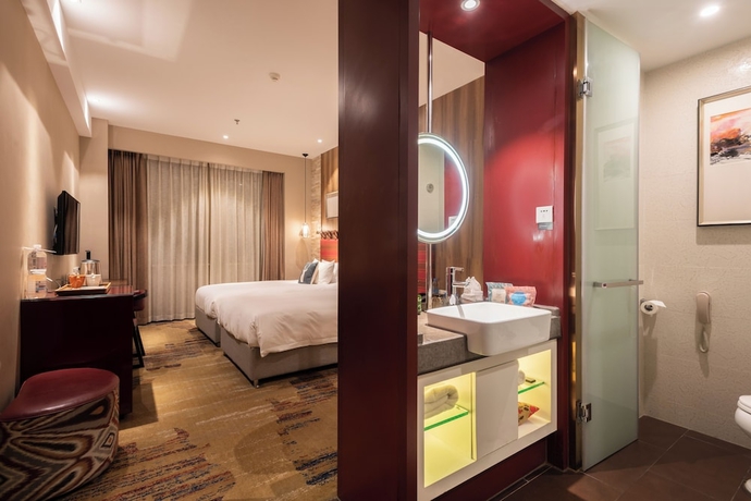 Imagen de la habitación del Hotel Yantai Lijing Peninsula. Foto 10