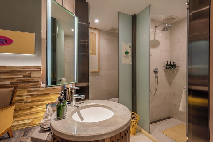 Imagen de la habitación del Hotel Yantai Lijing Peninsula. Foto 12