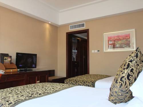 Imagen de la habitación del Hotel Yantai Mountain. Foto 3