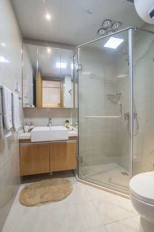 Imagen de la habitación del Hotel Yantai Tianma Argyle Suites. Foto 5