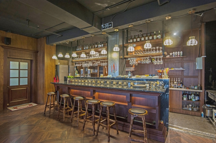 Imagen del bar/restaurante del Hotel Yantai Tianma Argyle Suites. Foto 4