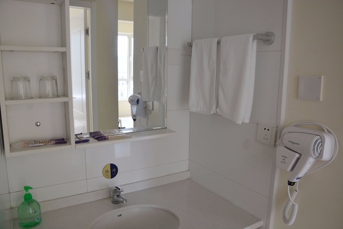 Imagen de la habitación del Hotel Yantai Tianma Xiangcheng Apartment. Foto 2