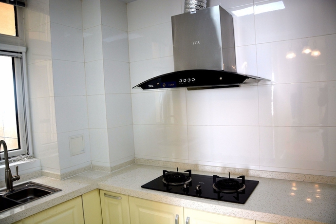 Imagen de la habitación del Hotel Yantai Tianma Xiangcheng Apartment. Foto 4