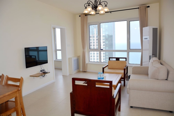 Imagen de la habitación del Hotel Yantai Tianma Xiangcheng Apartment. Foto 7