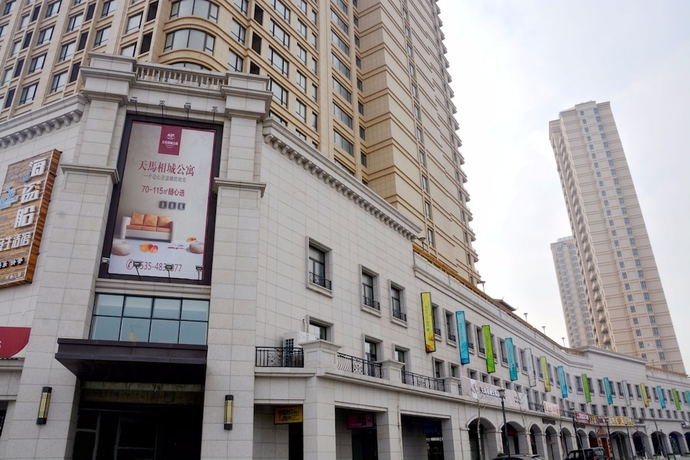Imagen general del Hotel Yantai Tianma Xiangcheng Apartment. Foto 1