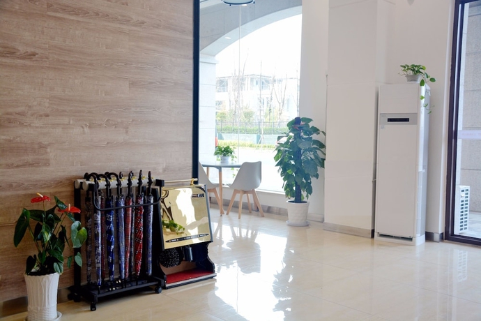 Imagen de los interiores del Hotel Yantai Tianma Xiangcheng Apartment. Foto 17