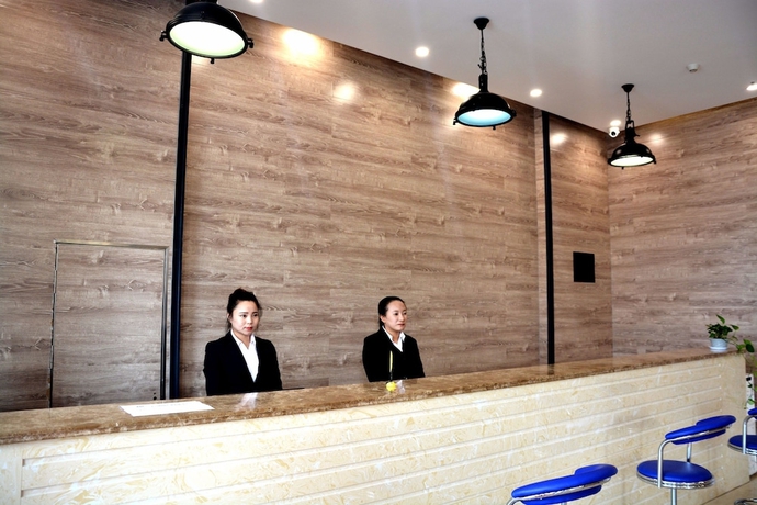 Imagen de los interiores del Hotel Yantai Tianma Xiangcheng Apartment. Foto 19