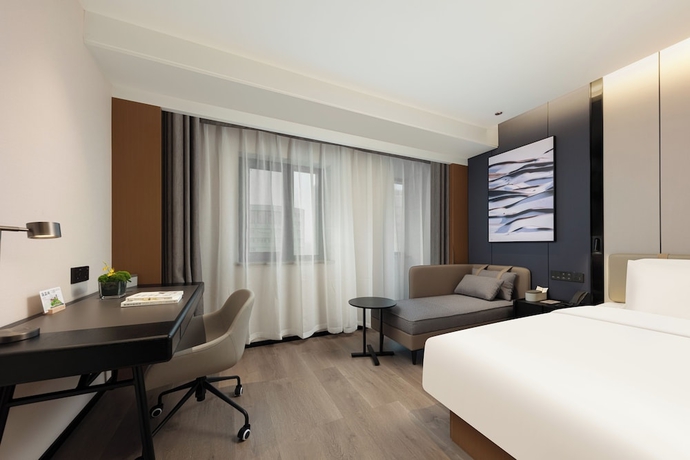 Imagen de la habitación del Hotel Yantaizhannandajieyaduojiudian. Foto 4