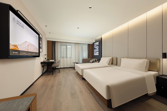 Imagen de la habitación del Hotel Yantaizhannandajieyaduojiudian. Foto 5