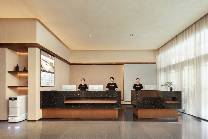 Imagen de los interiores del Hotel Yantaizhannandajieyaduojiudian. Foto 11