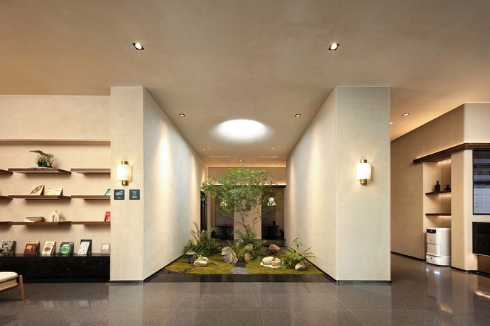 Imagen de los interiores del Hotel Yantaizhannandajieyaduojiudian. Foto 12