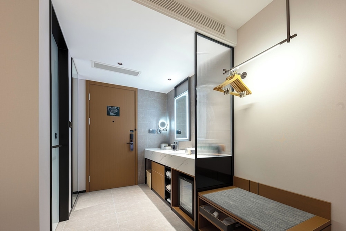 Imagen de la habitación del Hotel Yantaizhannandajieyaduojiudian. Foto 8