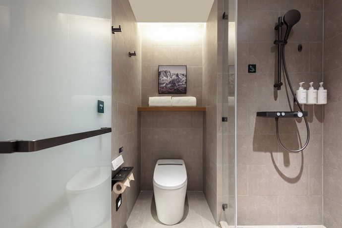 Imagen de la habitación del Hotel Yantaizhannandajieyaduojiudian. Foto 9