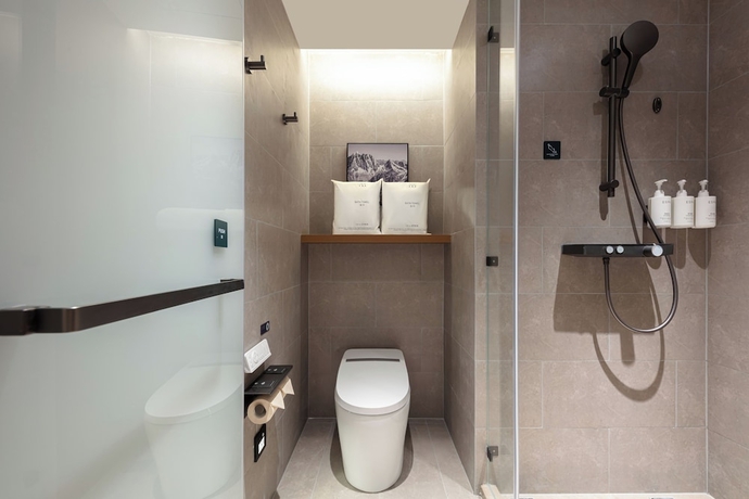 Imagen de la habitación del Hotel Yantaizhannandajieyaduojiudian. Foto 10