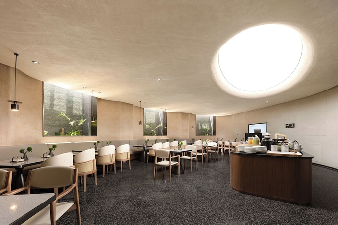 Imagen del bar/restaurante del Hotel Yantaizhannandajieyaduojiudian. Foto 1