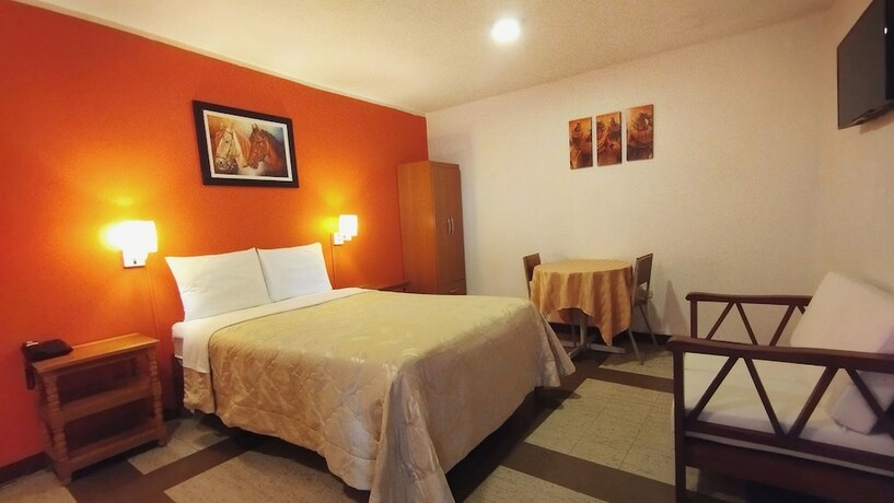 Imagen de la habitación del Hotel Ya&ntilde;ez Inn. Foto 18