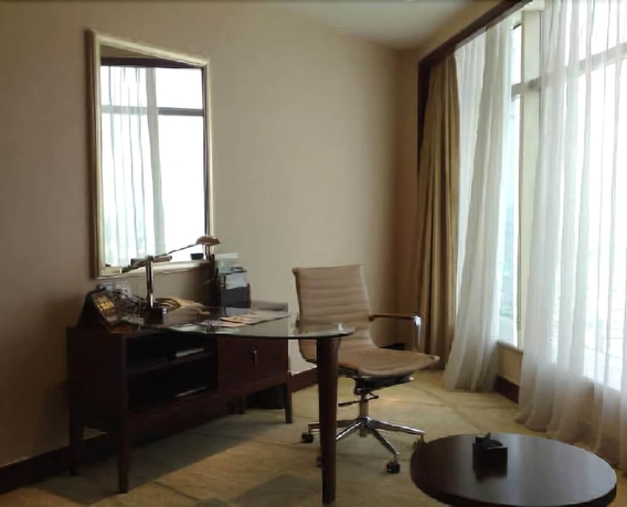 Imagen de la habitación del Hotel Yaojiang New Century Grand Zhuji. Foto 12