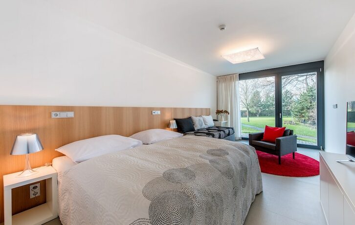 Imagen de la habitación del Hotel Yard Resort. Foto 16