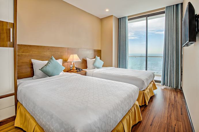 Imagen de la habitación del Hotel Yarra Ocean Suites Danang. Foto 7