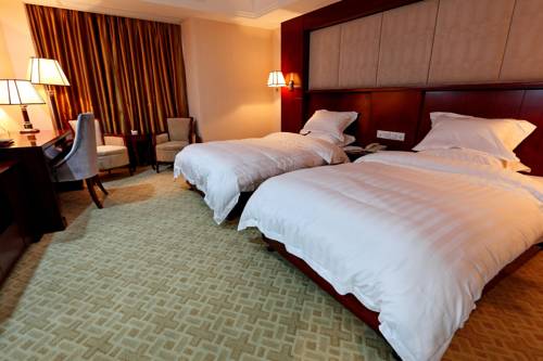 Imagen de la habitación del Hotel Yasheng Taicang Shaxi. Foto 6