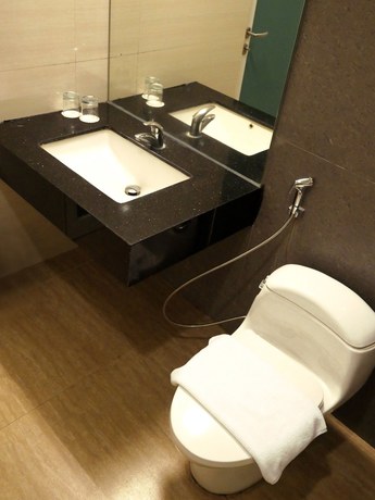 Imagen de la habitación del Hotel Yasmin Karawaci. Foto 12