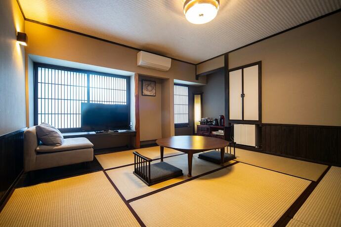 Imagen de la habitación del Hotel Yasuragi No Yado Yufu. Foto 12