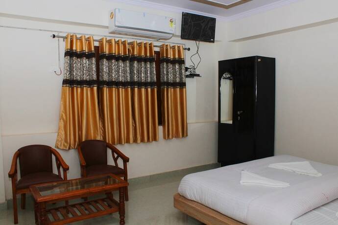 Imagen de la habitación del Hotel Yatrik Inn. Foto 17