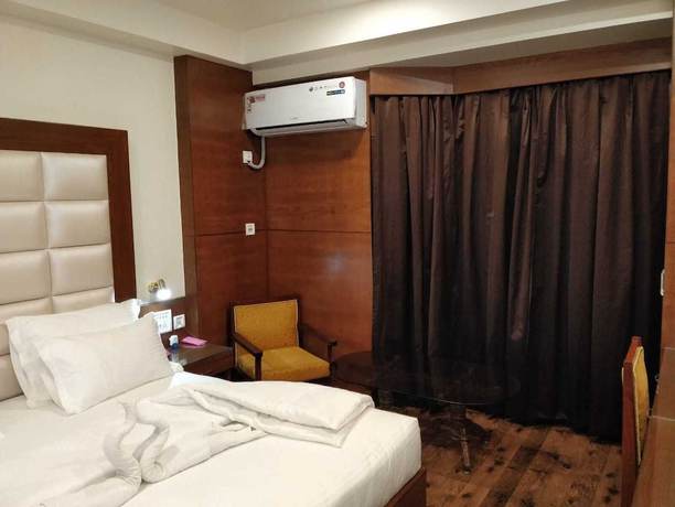 Imagen de la habitación del Hotel Yatrik, Jhansi. Foto 15