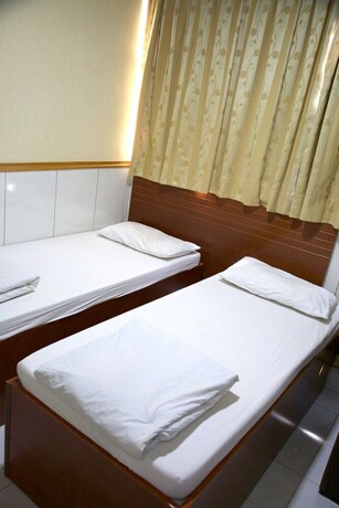 Imagen de la habitación del Hotel Yau King. Foto 14