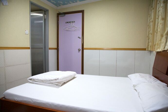 Imagen de la habitación del Hotel Yau King. Foto 18
