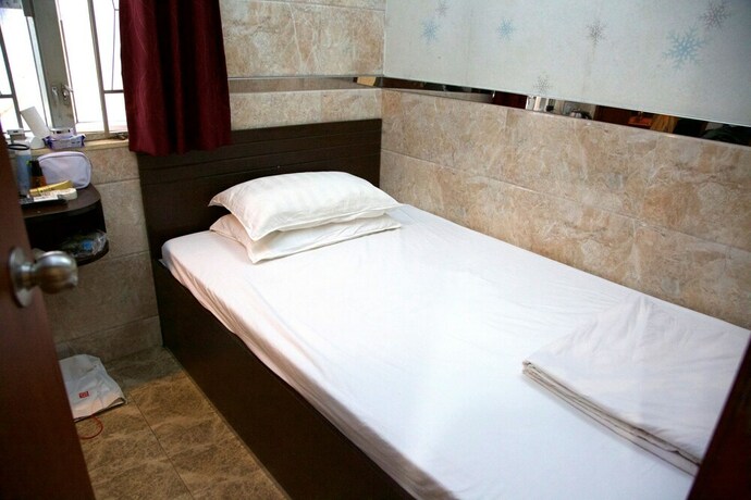 Imagen de la habitación del Hotel Yau King. Foto 19