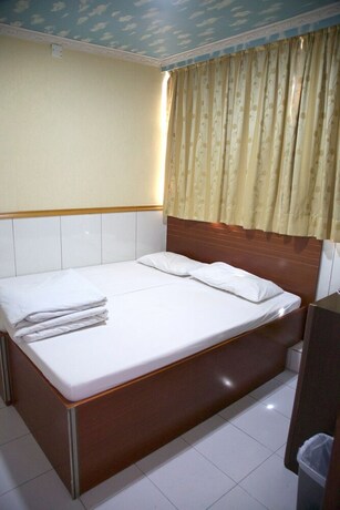 Imagen de la habitación del Hotel Yau King. Foto 22