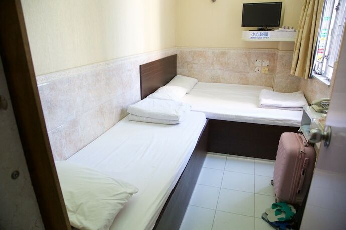 Imagen de la habitación del Hotel Yau King. Foto 24