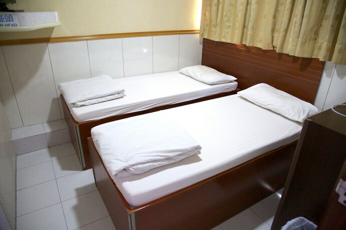 Imagen de la habitación del Hotel Yau King. Foto 26