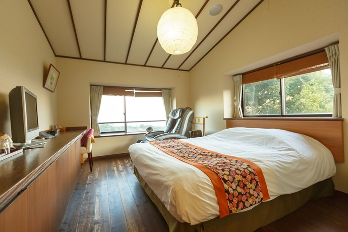 Imagen de la habitación del Hotel Yawatano Onsenkyo Morinoyu Kiranosato. Foto 4