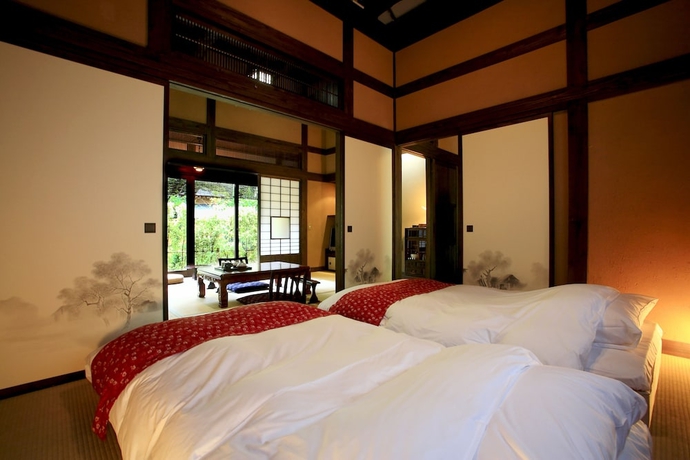 Imagen de la habitación del Hotel Yawatano Onsenkyo Morinoyu Kiranosato. Foto 9