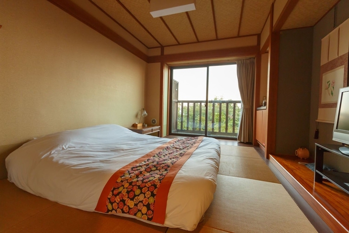 Imagen de la habitación del Hotel Yawatano Onsenkyo Morinoyu Kiranosato. Foto 11