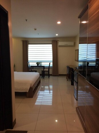 Imagen de la habitación del Hotel Ybc Grand. Foto 16