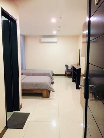 Imagen de la habitación del Hotel Ybc Grand. Foto 25