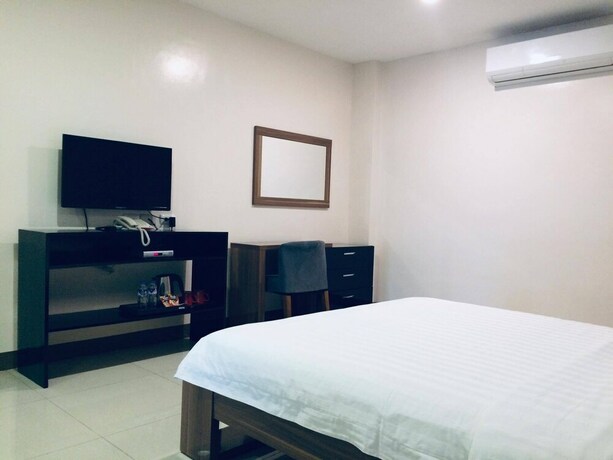 Imagen de la habitación del Hotel Ybc Grand. Foto 26