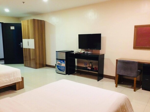 Imagen de la habitación del Hotel Ybc Grand. Foto 28